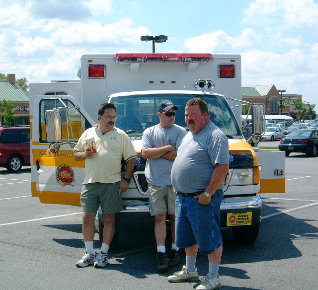 Firefighters Mike Predmore, Matt Wood and Lary Hicks check out the sights at the McDonalds public education event