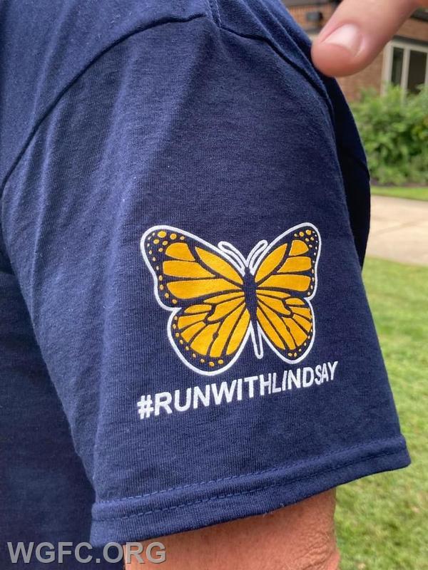 WGFC team shirts were logo'd with the #RunWithLindsay message.