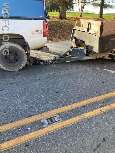 The trailer was heavily damaged after being struck from the rear.  