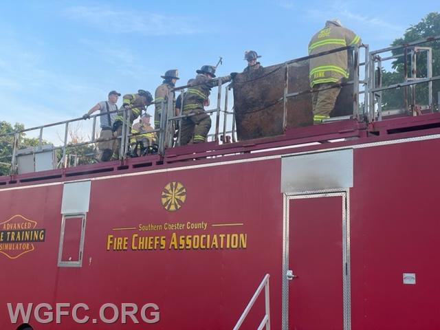 This specialized training trailer allow the WGFC to train on a variety of scenarios with smoke and heat.  Here, members are learning roof ventilation operations.