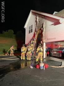 WGFC crews work to open up the wall and check for fire spread at this Kings Row Road house fire in New London Township.