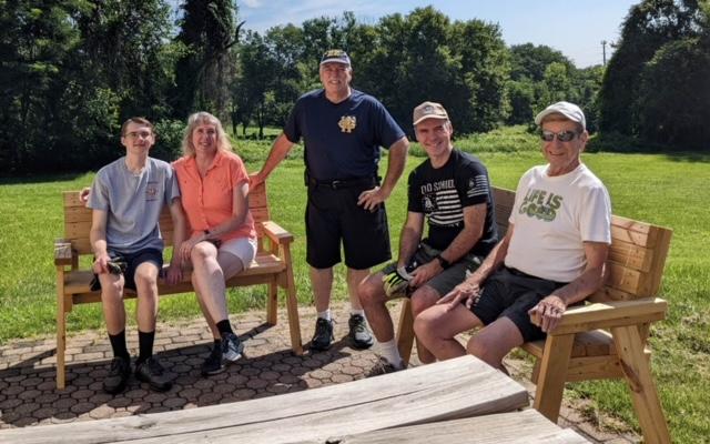 Eagle Scout Candidate Andrew Russell donated these two benches to the WGFC New London Station.  Also pictured are his parents and grandfather, along with WGFC member Charles Foy.