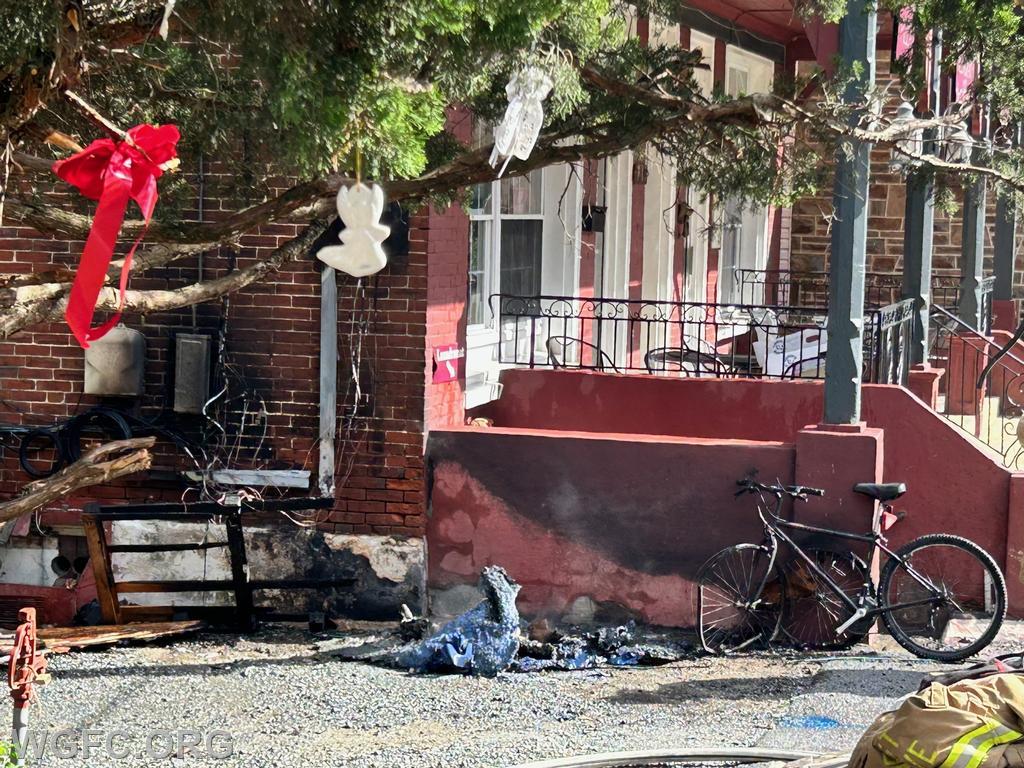 The fire in a trash container did damage to utilities on the outside of the building and an adjacent bicycle, but did not extend into the building.  