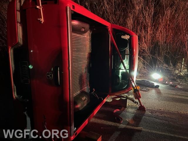 This view shows the other side of the vehicle with rescue struts maintaining a stable vehicle on its side.