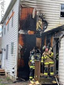 WGFC firefighters work to open up walls and check for fire extension at a house fire in East Nottingham Township Saturday.