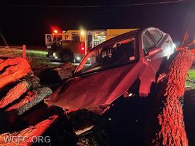 This car left the roadway on 896 in London Britain Township and struck a pile of logs.  Engine 22-3 is on scene.