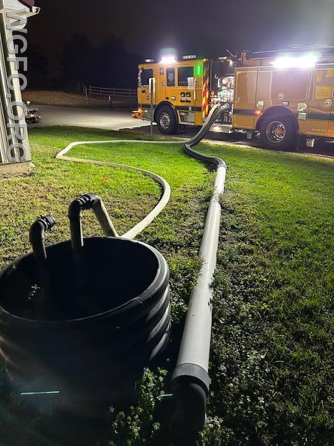 WGFC Engine 22-1 has the tanker fill site established at the fire station's buried tank in Nichol Park.