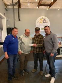Accepting a donation from Tom Marinelli and Blondes & Brewnettes of West Grove are Fire Chief Felker, Past Chief Gattorno, and Asst. Chief Keiser.  We thank this great West Grove business for their support.  
