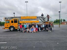 Students from the Avon Grove Middle School pose with Ladder 22 for today's annual Egg Drop. 