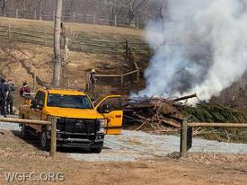 WGFC's Brush 22 is used to extinguish a fire at this brush fire in Franklin Township Saturday.  