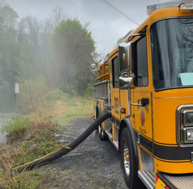 WGFC Engine 22-1 drafts water from the old quarry as part of a training exercise today.