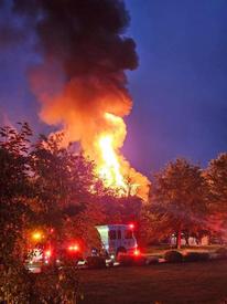 Fire from the roof greeted area fire companies at this house fire in Pocopson Township Friday night. 