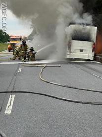 WGFC firefighters work to extinguish a fire on a motorcoach transporting students along the US Route 1 Bypass in Penn Township.  There were no injuries.