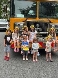 Lots of smiling faces at this afternoon's birthday party in New London during a visit from Engine 22-1.