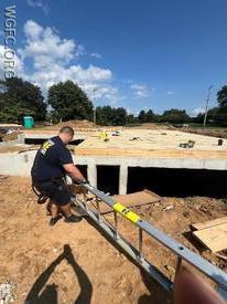 WGFC firefighters used their training to utilize a ground ladder to help remove a patient from below grade at this house construction site.