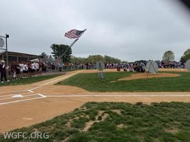 Ladder 22 displays the WGFC's giant American Flag at opening ceremonies for the Avon Grove Little League.