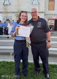 WGFC fire responder Myla Kerr shows off a Clinical Save Award along with her EMT instructor WGFC Captain Rob Linnenbaugh during EMT graduction ceremonies.