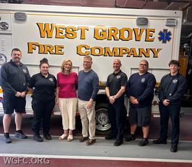 London Grove resident Carolyn Haines and her husband Rob Haines pose with some of the crew that helped save her life after sudden cardiac arrest.